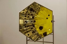 Olafur Eliasson. Lava kaleidoscope, 2012. Aluminium, stainless steel, mirror, colored glass(yellow), lava rock, 211 x 88.5 x 220 cm.&nbsp;Courtesy of the artist &amp;amp; PKM Gallery.