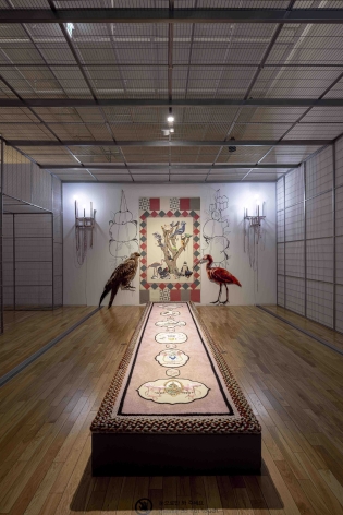 Young In Hong.&nbsp;To Paint the Portrait of a Bird, 2019,&nbsp;Metal cage, video projection, wood, recycled yarn, fabric, embroidery on cotton, light bulbs, metal, sound installation.&nbsp;Courtesy of the artist &amp;amp; PKM Gallery.&nbsp;Photo Credit:&nbsp;Korea Artist Prize Exhibition 2019, MMCA, Seoul.